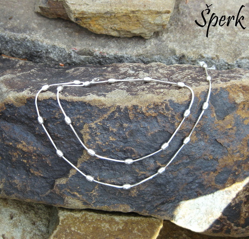 Stříbrný řetízek ..... 1