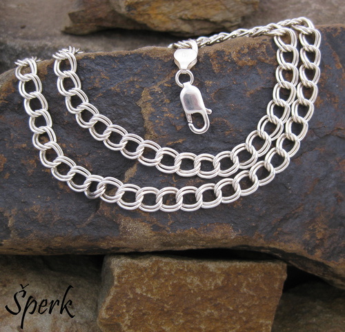 Stříbrný řetízek ..... 1