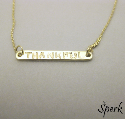 Zlatý náhrdelník s nápisem 1